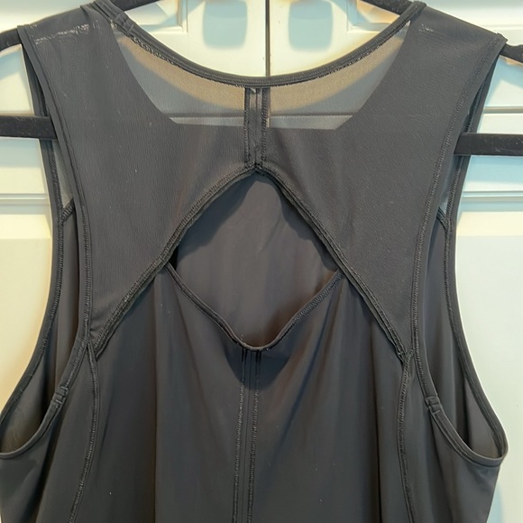 Lululemon black size 12 mesh Back keyhole loosefitting top. Very good shape. 👍 - Picture 4 of 10
